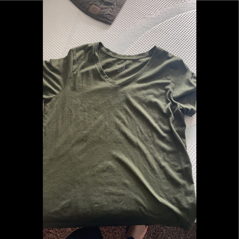 Navy green womens t shirt .work a few times but no stains .